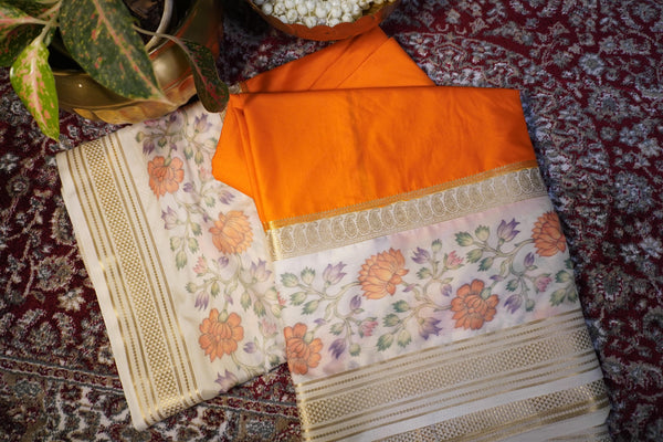 Premium Crepe Silk Saree – Orange Saree with White Floral Contrast Border