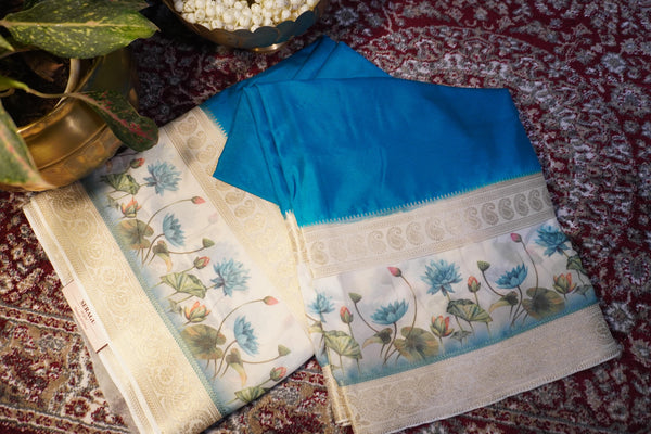 Premium Crepe Silk Saree – Teal Blue Saree with White Floral Contrast Border